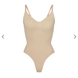 SKIMS 
Shapewear Bodysuits seamless sculpting 
THONG BODYSUIT